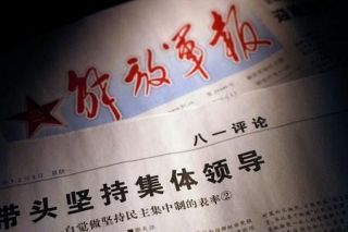 中国軍機関紙「集団指導」訴え　権力集中に挑戦との見方も